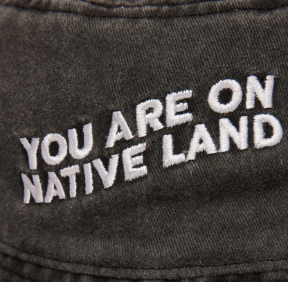 'YOU ARE ON NATIVE LAND' Bucket Hat